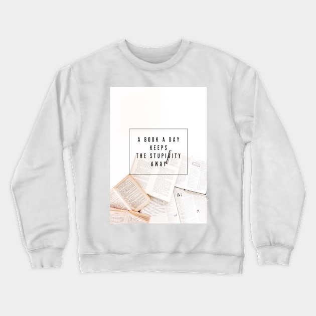 A book a day Crewneck Sweatshirt by missguiguitte